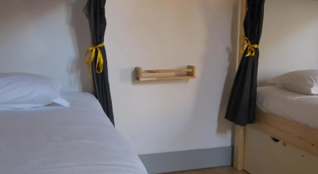 Кровать в общем номере Most Art Boutique Hostel