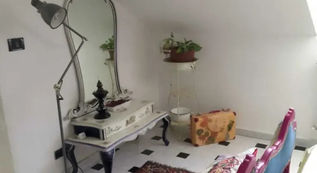 Spacious and Naturally Bright Bomboniera Rooftop Favors Apartment