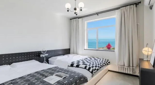 Люкс с 4 комнатами с балконом и с видом на море Qingdao 77Home Seaview Travel Photography Homestay (May Fourth Square)
