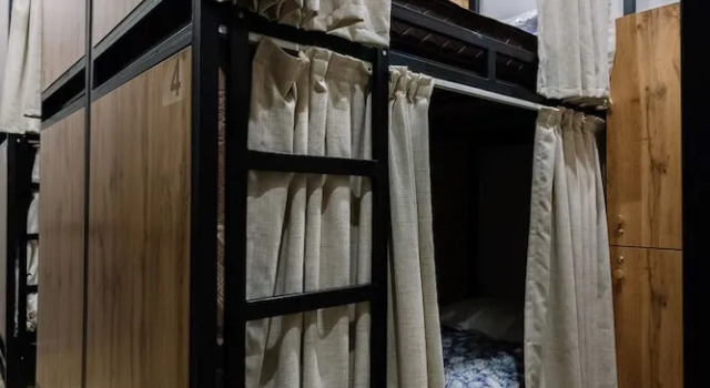 Postel ve společném pokoji pro muže Hostel Doma