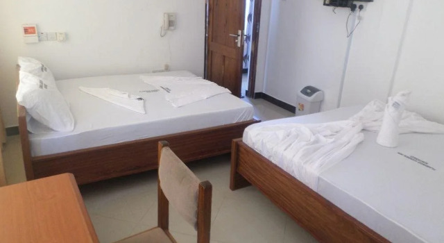 Flamingo Garden Inn & Hotel, Buchen Sie Hotel Hotels in Daressalam mit Parkplatz, Parkplätze