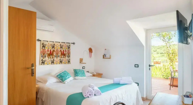 Двухместный номер Economy Мансарда с балконом Domus De Janas Sul Mare