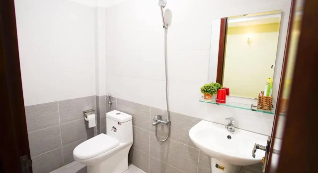 Кровать в общем номере Hoa Sua Hotel