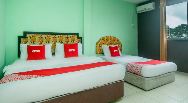 Номер Deluxe OYO 90124 Payang Puri Baru Hotel