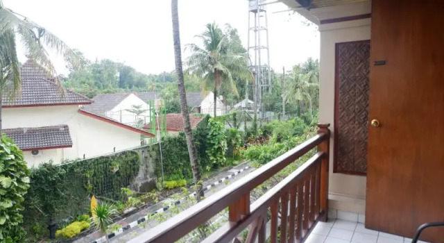 Двухместный номер Deluxe с балконом и с видом на сад Отель Джокьякарта The Jayakarta Yogyakarta