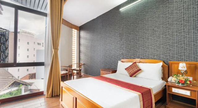 Четырёхместный семейный номер Standard Sai Gon Airport Hotel