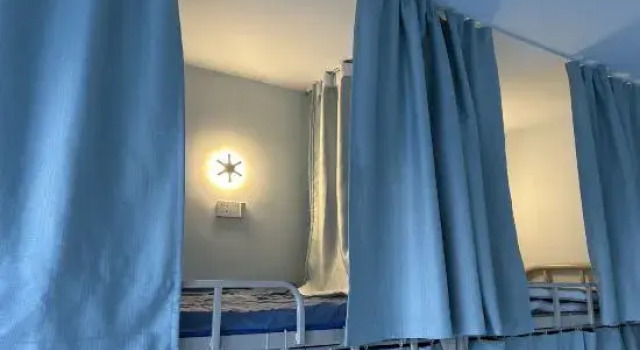 Кровать в общем номере Dali Kanhai Hostel