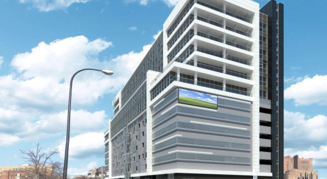 Кровать в общем номере Aloft by Marriott Buffalo Downtown
