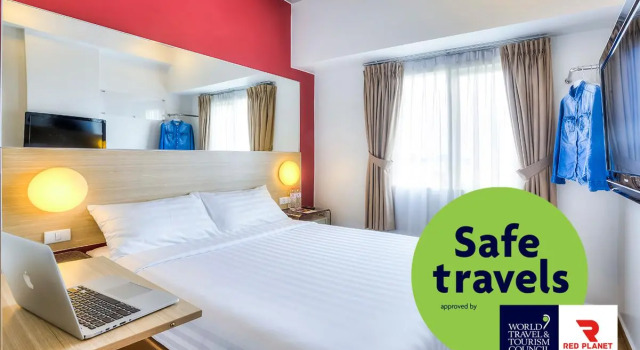 Кровать в общем номере Monoloog Hotel Pekanbaru