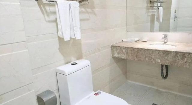 Номер Deluxe Huaxi Hotel