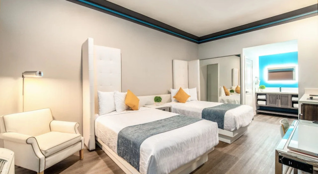 Четырёхместный номер Classic Aspire Inn Studios & Spas