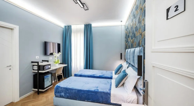 Comfort huone Colonna Inn
