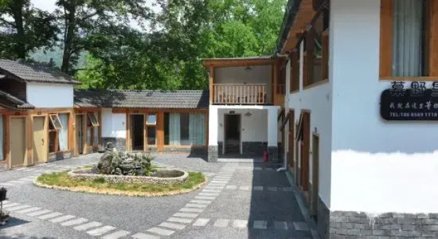 Mount Fanjing Muyexingkong Homestay, Rezerwuj Hotel Hotele w Guizhou z parkingiem, Parking