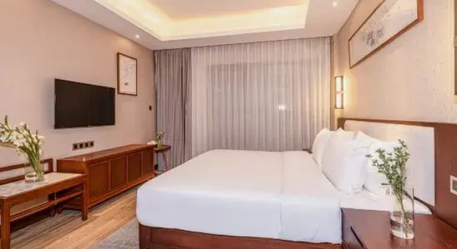 Люкс Days Inn Wyndham Xishuangbanna Jinghong Rainforest Park (Mengluo Dafosi Branch)