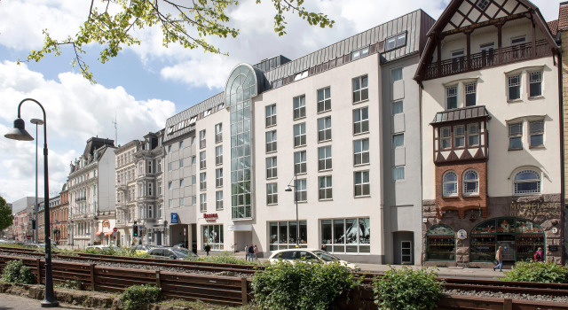 Ramada by Wyndham Flensburg City, Забронировать Отель Фленсбург земля Шлезвиг-Гольштейн, рядом с Фленсбургская гавань