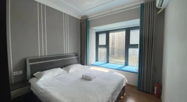 Люкс с 3 комнатами с видом на сад Qidong Dreams Seaview Theme Boutique Apartment (Hengda Venice Shop)