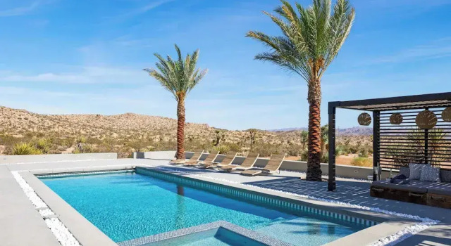 Iconic 6BR Desert Retreat w/ Pool, Pickleball & Fire Pit Joshua Tree Mansion by Avantstay