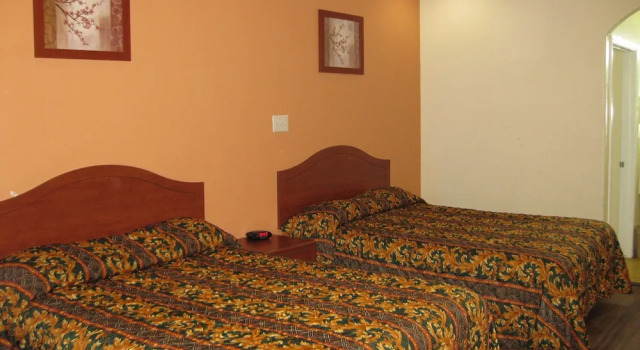 Scottish Inn and Suites, Buchen Sie Hotel Angleton Texas Gulf Coast