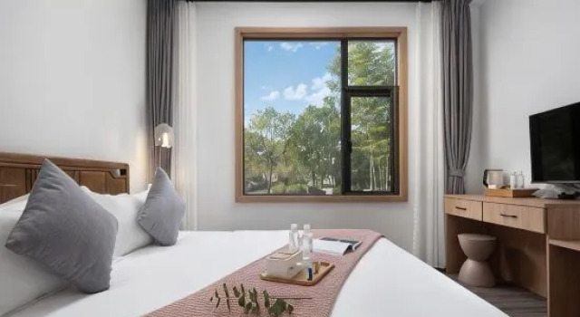 Кровать в общем номере с 6 комнатами Naluwan Changxing elegant resort Yunsu