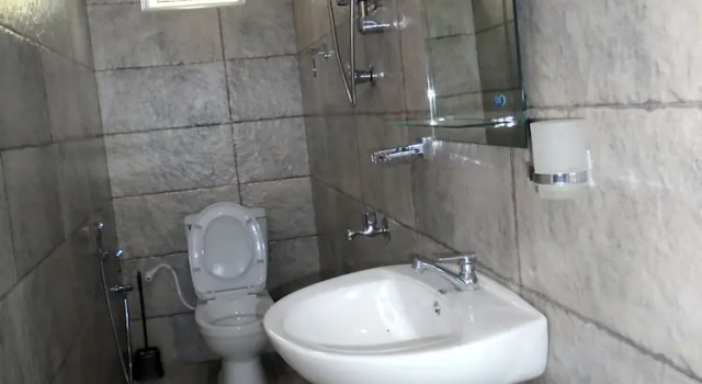 Standard kétágyas szoba a kertre néző kilátással Bee Line Home Stay