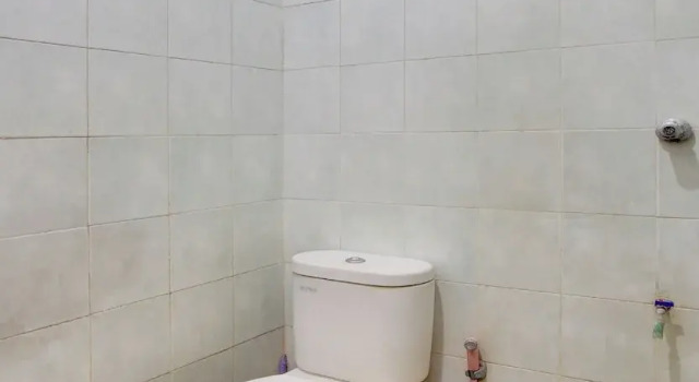 Номер Economy Hotel O Griya Pius Syariah Malioboro