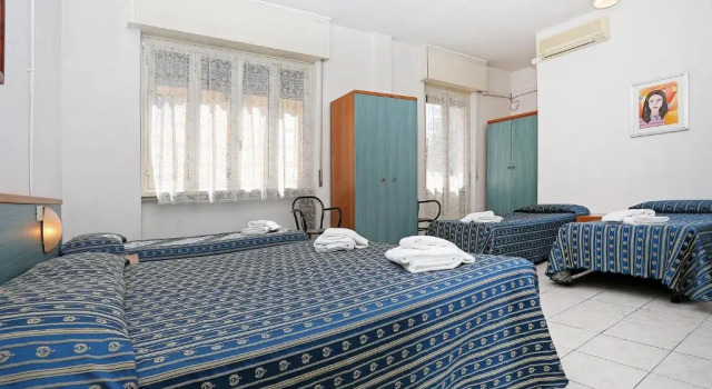 Четырёхместный номер Albergo Athena