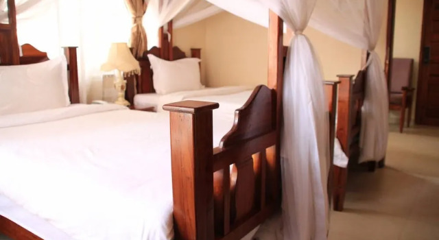 B and B Comfort Hotel, Забронировать Отель Нгамбо , рядом с Maruhubi Historical Sites