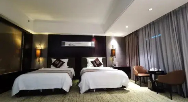 Номер Deluxe Huangting Lijing Hotel