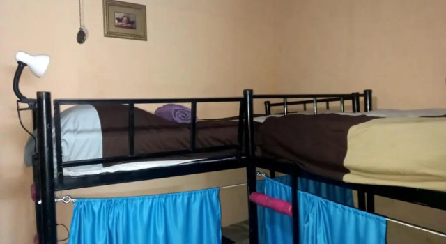 Кровать в общем номере Casa Vieja Guest House