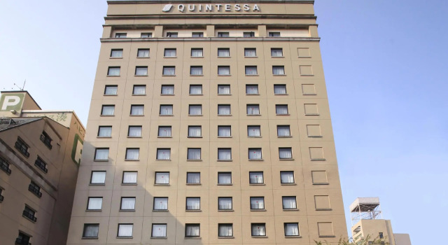 Кровать в общем номере Quintessa Hotel Sasebo