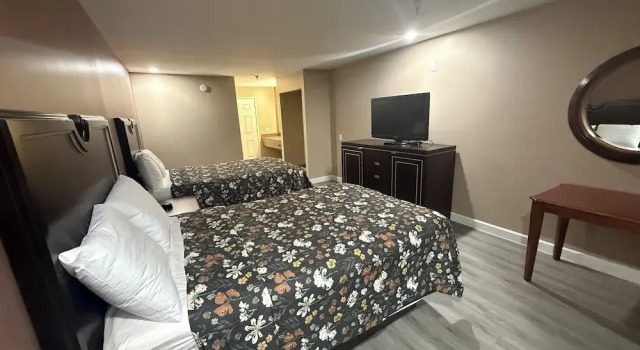 Четырёхместный номер Standard Magnolia Bay Hotel & Suites