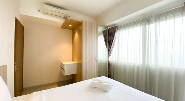 Апартаменты Cozy and Minimalist 2BR at 8th Floor The Oasis Cikarang Apartment By Travelio