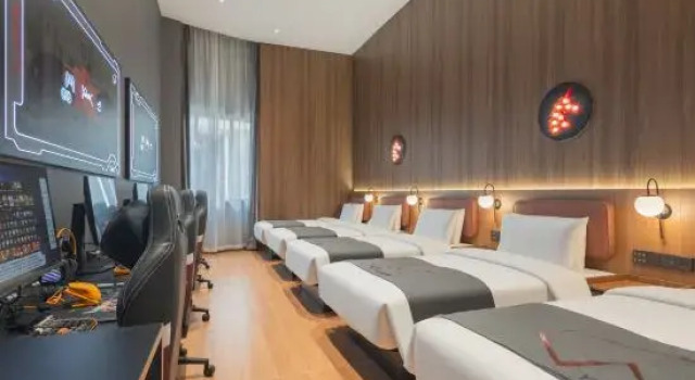 Кровать в общем номере YUNIK E-Sports Hotel (Nantong Haohe Scenic Area Yuanyong Plaza)