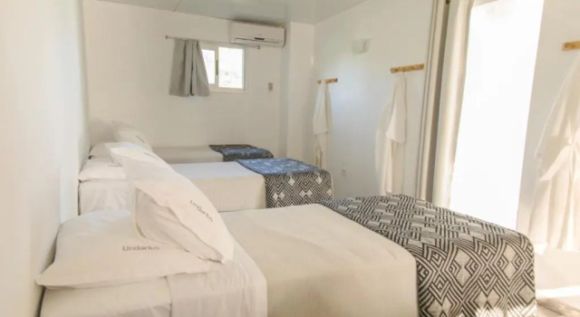 Кровать в общем номере (мужской номер) Undarius Hotel