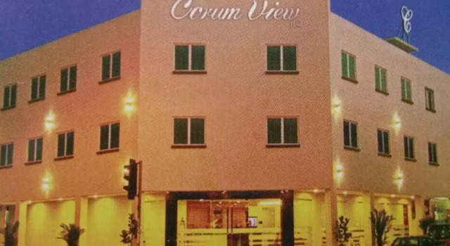Кровать в общем номере The Corum View Hotel