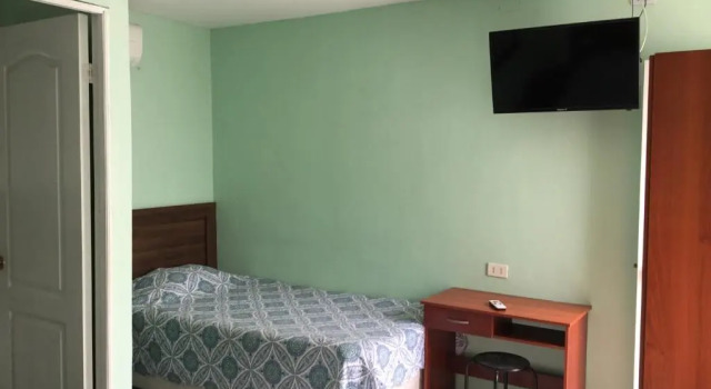 Standard Triple room Hostal Playa Brava