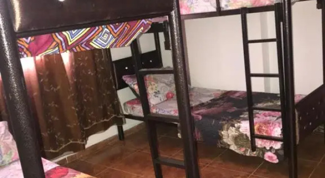 Cama em dormitório Sami Hostel