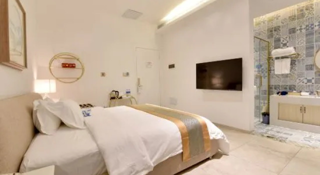 Люкс с 3 комнатами Отель Santorini Hot Spring Resort