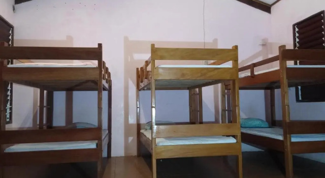 Кровать в общем номере Bluepango Guest House