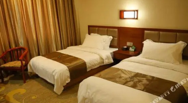 Qingdao Fengda Holiday Hotel, Забронировать Отель Циндао 