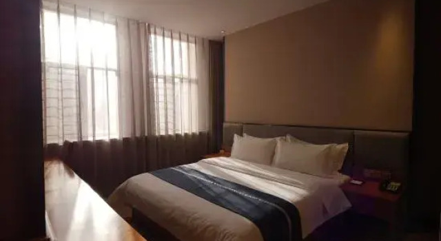 Люкс Business Daqing Jixiang Kaiyue Business Hotel (Daqing East Station People's Hospital)