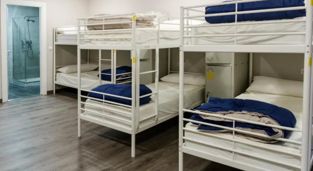 Кровать в общем номере Hostel Catedral Burgos
