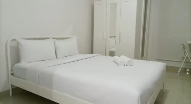 Апартаменты Comfortable And Tidy Studio At Barsa City Apartment