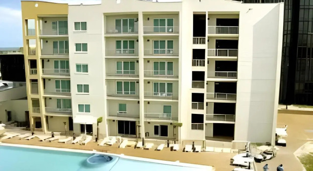 Peninsula Island Resort & Spa - Beachfront Property at South Padre Island, Забронировать Курортный отель Саут-Падре-Айленд Rio Grande Valley, рядом с Sea Ranch Marina 1
