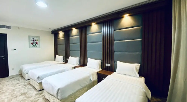 Четырёхместный номер Deluxe Itlalat Uhud Hotel - فندق إطلالة احد