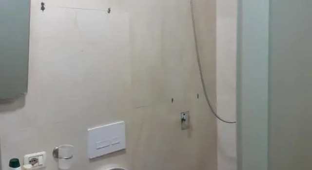 Кровать в общем номере Hotel Driti