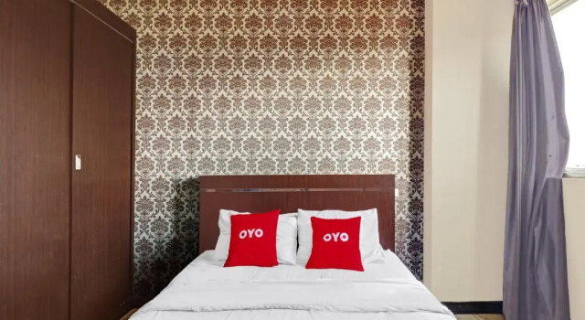 Номер Deluxe OYO 90465 Ars Ira Property The Suites Metro