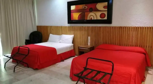 Standard quadruple chambre Hotel BRIUM