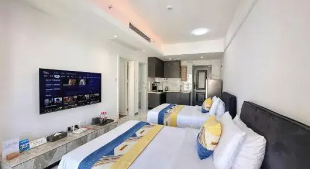 Четырёхместный семейный люкс с балконом и с видом на море Beihai He'an Coast Liwan Homestay