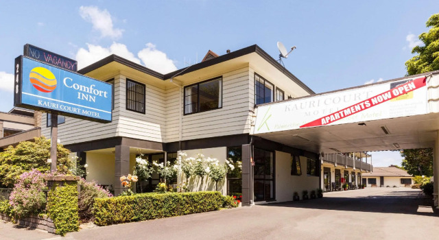 Кровать в общем номере Kauri Court Motel and Apartments